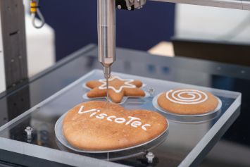 Soluciones de dosificación de ViscoTec para la industria alimentaria Soluciones de dosificación de ViscoTec para la industria alimentaria